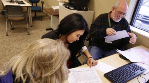 student helping with taxes