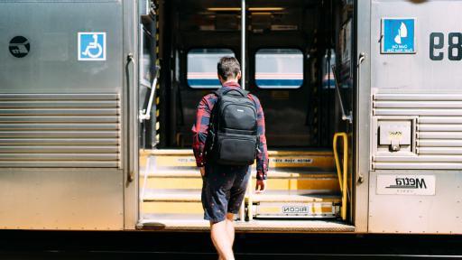 student at train station